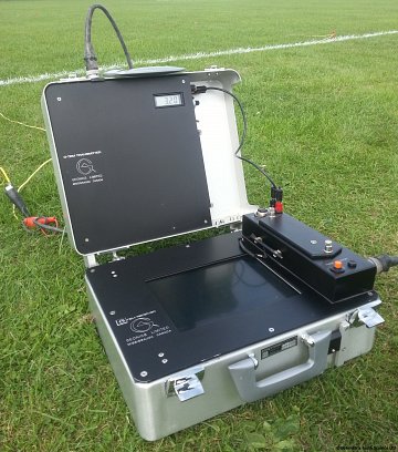 The bottom of the case holds the recording electronics and data acquisition interface, whilst the lid contains a TEM47 transmitter.