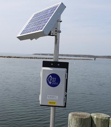 Time Monitoring system deployment with solar panel. Image courtesy of Falmouth Scientific Inc.